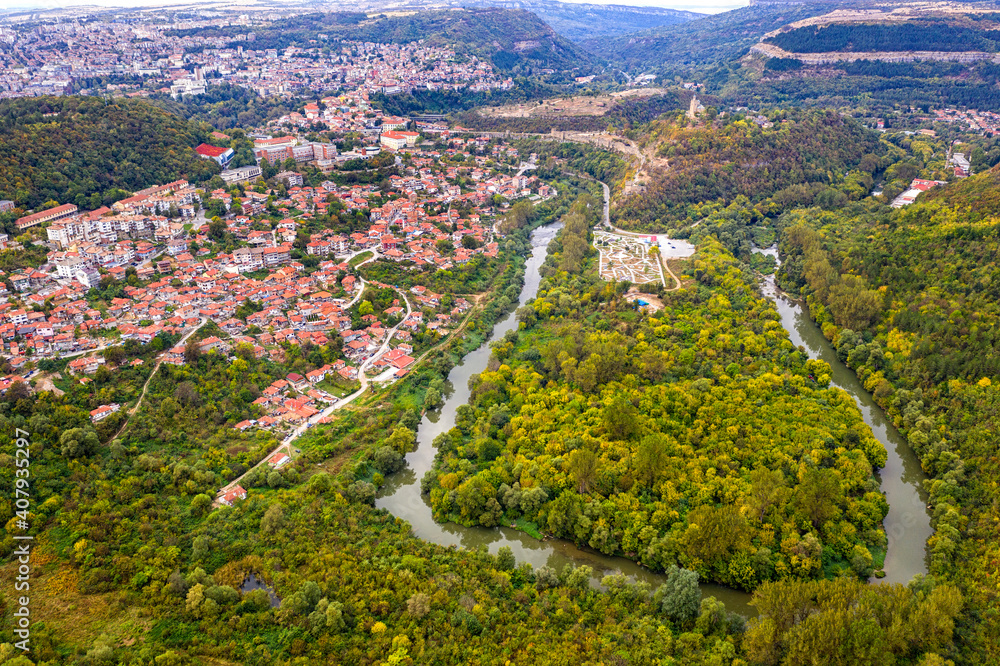 Aerial view from drone of the big curve of the river near city, Yantra and Veliko Tarnovo, Bulgaria