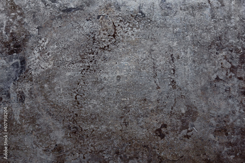 Texture of old metal sheet. Dark grunge background © Olga Iljinich