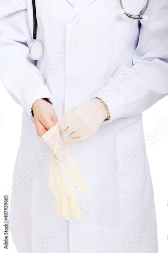 Oriental young women doctors wear surgical gloves
