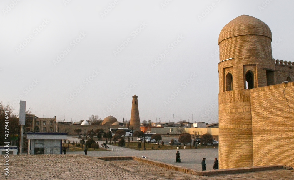 Fototapeta premium Khiva, Uzbekistan - December 02 2019: Historic architecture of Itchan Kala, walled inner town of the city of Khiva