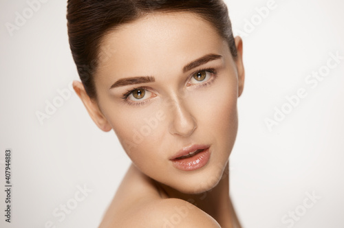 close-up portrait of stunning female with perfect skin