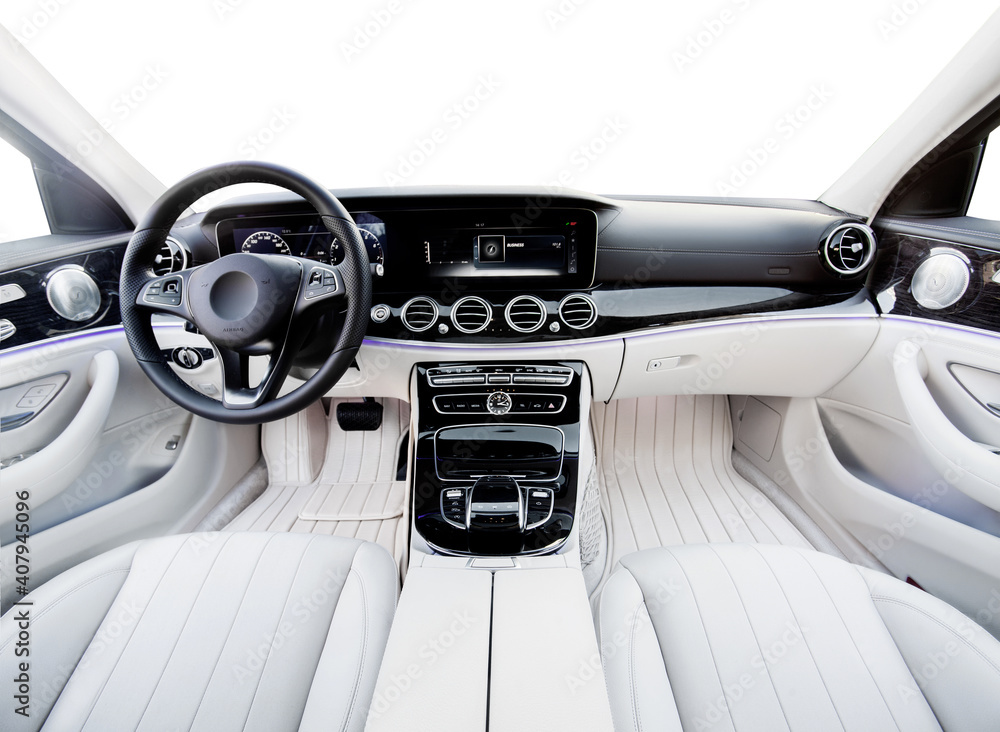 Luxury car interior. Steering wheel, shift lever and dashboard. white ...