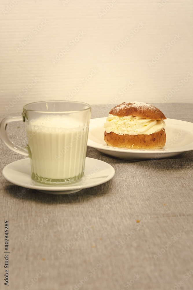 Swedish tradiatonal food Semlor. Served with hot milk in old traditional families, Gothenburg Sweden Swedish tradiatonal food Semlor. Served with hot milk in old traditional families, Gothenburg Sweden