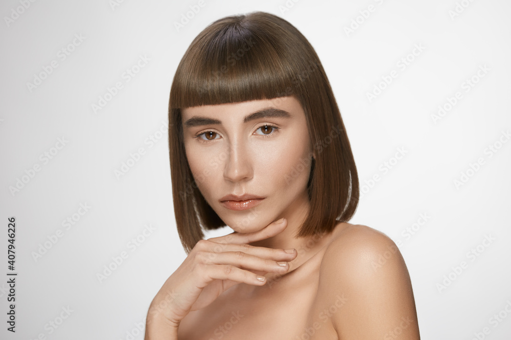 portrait of beautiful woman with perfect skin looking to camera portrait of beautiful woman with perfect skin looking to camera