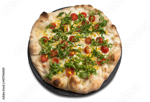 Pizza with mozzarella, chopped cherry tomatoes, corn and arugula salad isolated on white background. Top view, flat lay