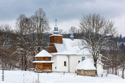 Picturesque Lopienka Orthodox Church in Bieszczady Mountains in Poland. Snowy Winter Wonderland