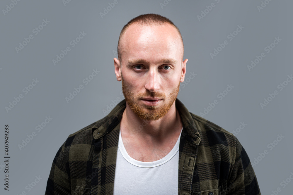 Fototapeta premium Fashion young man. Handsome guy with confident face.