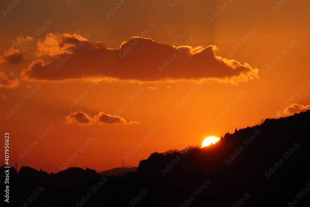 Fototapeta premium 雲と夕日