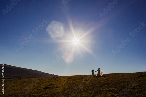 person walking in the desert