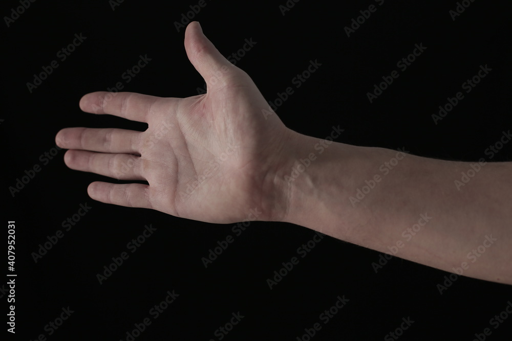 Human hand on black background Human hand on black background