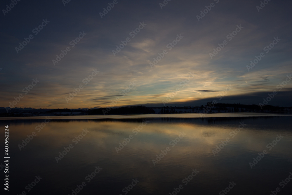 colorful sunset over the lake of pfaeffikon (Pfäffikersee)