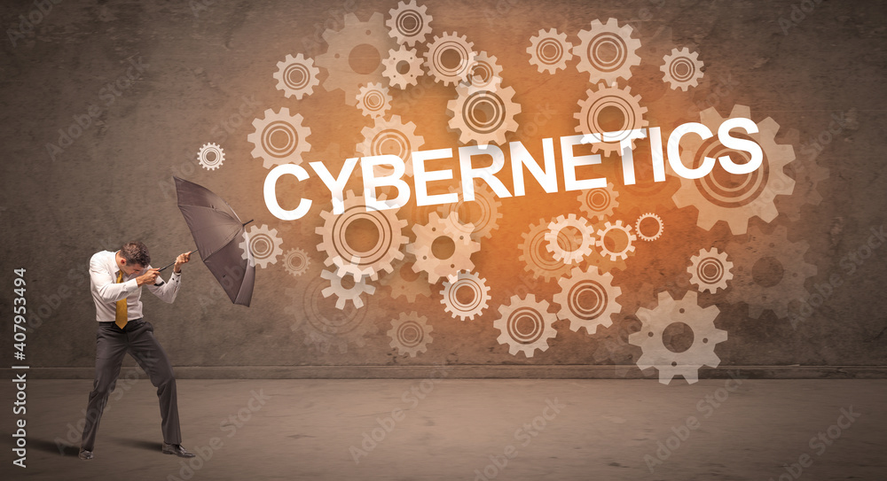 Businessman defending with umbrella from CYBERNETICS inscription, technology concept Businessman defending with umbrella from CYBERNETICS inscription, technology concept