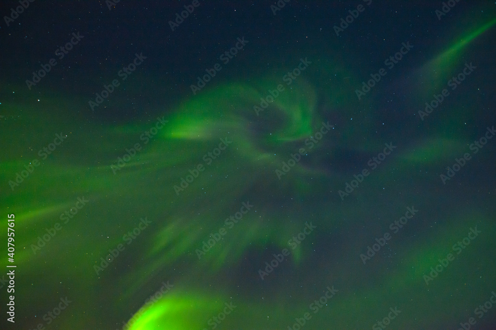 Aurora borealis in the sky at night.
