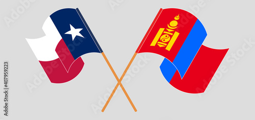 Crossed and waving flags of the State of Texas and Mongolia