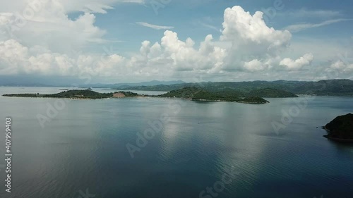 aerial seascape, tropical vacation and island hopping concept. Gilli air island and Lombok . Indonesia, south Gili islands. Gili Asahan island. A strip of sand on the beach and blue sea with corals photo