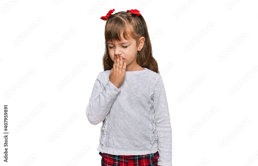 Little caucasian girl kid wearing casual clothes bored yawning tired covering mouth with hand. restless and sleepiness. Little caucasian girl kid wearing casual clothes bored yawning tired covering mouth with hand. restless and sleepiness.