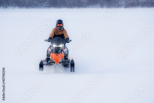 Fototapeta Naklejka Na Ścianę i Meble -  Snowmobile in the Canadian winter