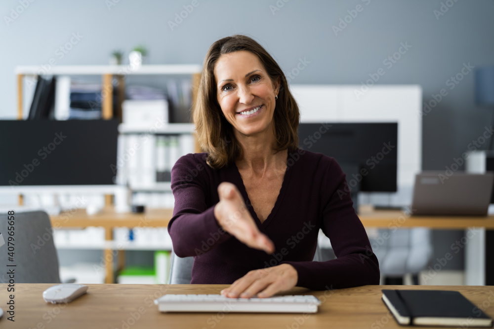 Executive Woman Welcoming Handshake Executive Woman Welcoming Handshake