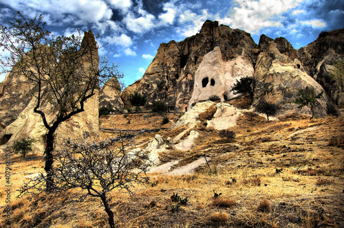 Ancient troglodyte village of Uchisar, in Cappadocia (Central Anatolia, Turkey). Fairy Chimneys photo