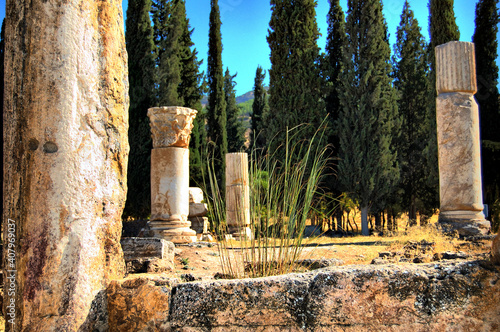 Panoramic view of the ancient Roman ruins of Hierapolis (Anatolia, Turkey). Next to the natural hot springs of Pamukkale.  photo