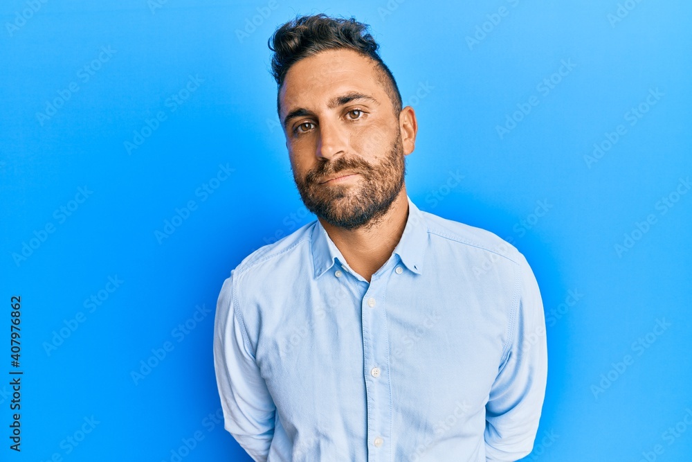 Handsome man with beard wearing casual clothes depressed and worry for distress, crying angry and afraid. sad expression. Handsome man with beard wearing casual clothes depressed and worry for distress, crying angry and afraid. sad expression.
