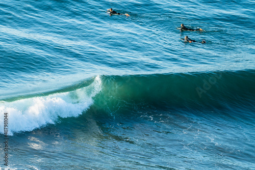 Photography Surfers waiting to catch the wave in the Pacific Ocean at Puertecillo spot in Chile