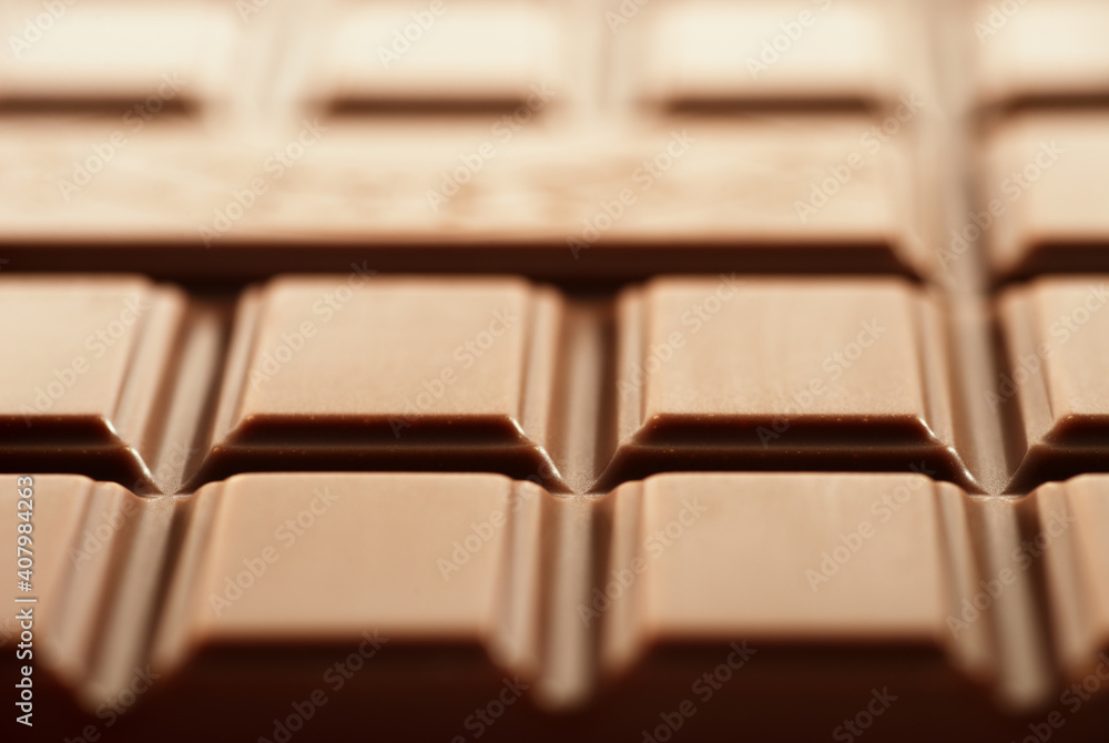 Closeup of a milk chocolate bar full frame. Closeup of a milk chocolate bar full frame.