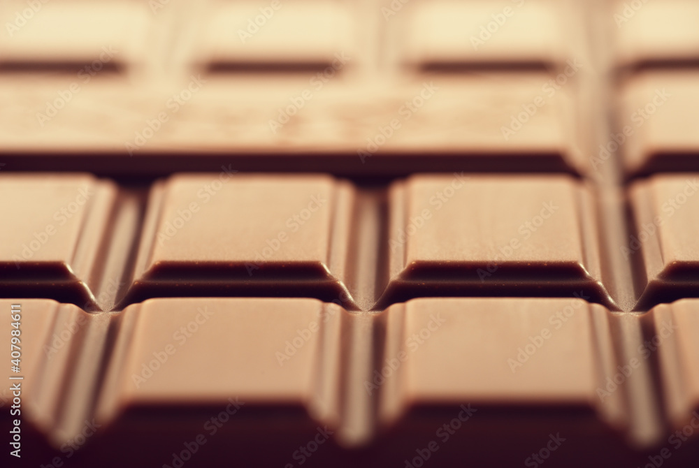 Closeup of a milk chocolate bar full frame. Closeup of a milk chocolate bar full frame.