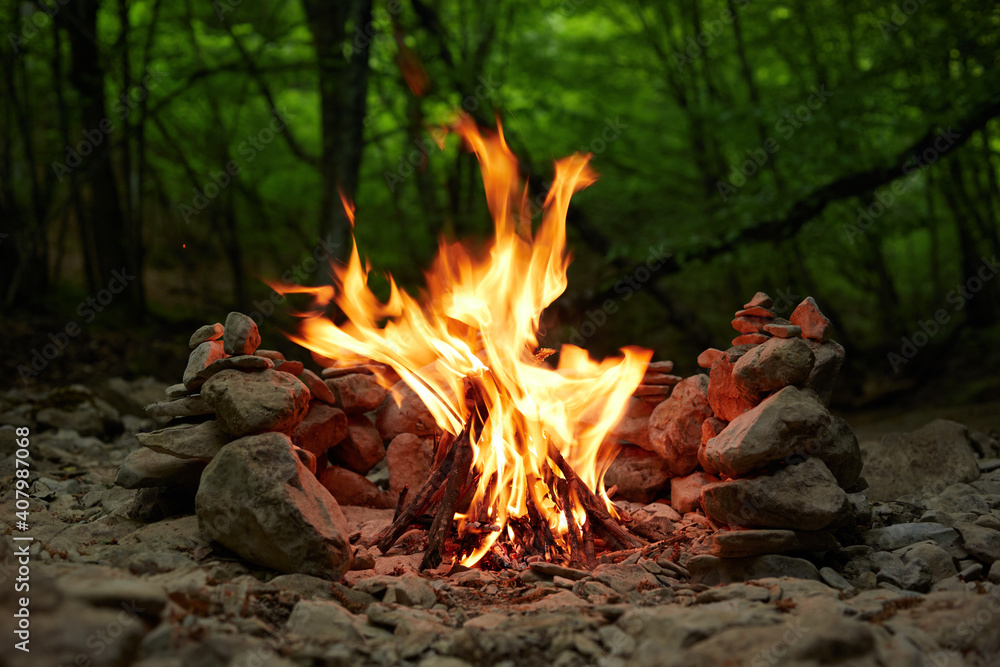 Closeup of a burning bonfire in the mountains in summer. Closeup of a burning bonfire in the mountains in summer.