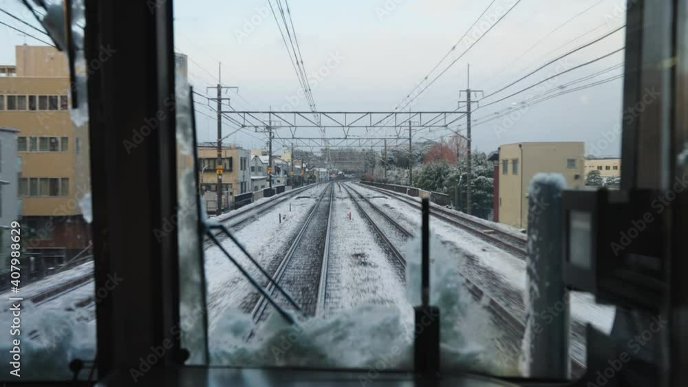 Train traveling through Japan to Kyoto, Snowy Weather, Point of View Shot Train traveling through Japan to Kyoto, Snowy Weather, Point of View Shot