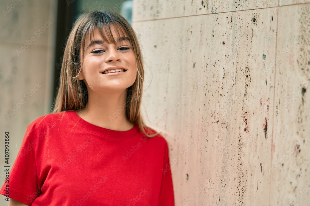Caucasian teenager girl smiling happy standing at the city. Caucasian teenager girl smiling happy standing at the city.