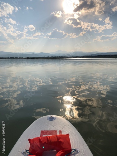 Stand Up Paddle Board on Lake with Mountains photo