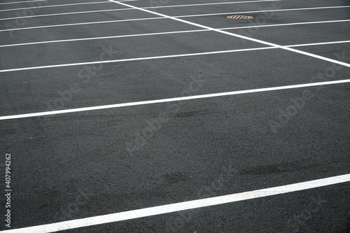 new paved parking lot with new painted strip lines
