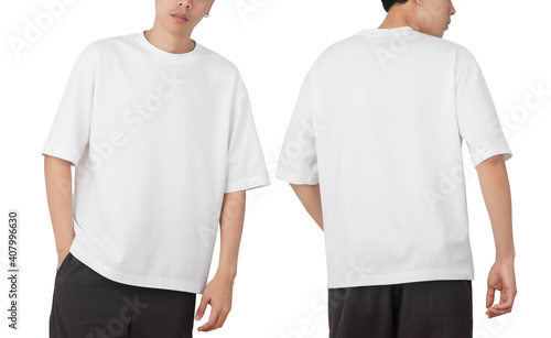 Young man in blank oversize t-shirt mockup front and back used as design template, isolated on white background with clipping path. photo