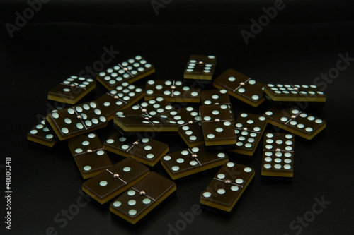 dominoes on black