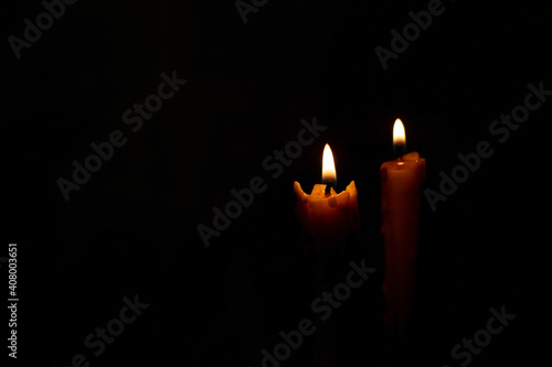 Candle light and dark flame