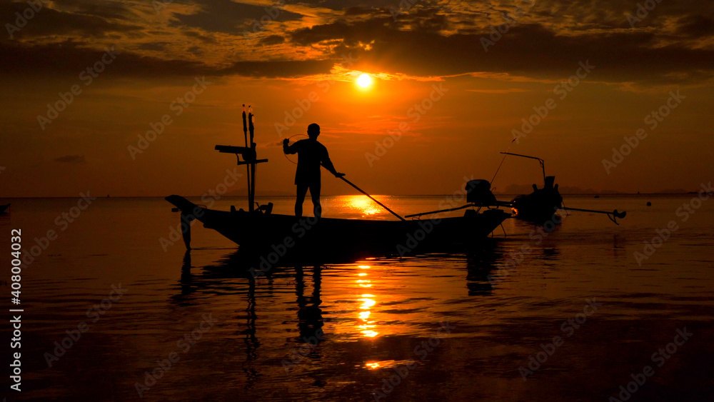 Fisherman in a twilight sunset time