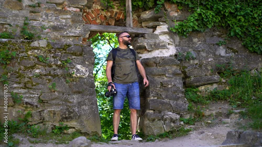Young man admire, sightseeing old medieval city in Romania Young man admire, sightseeing old medieval city in Romania