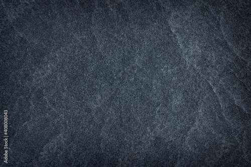 Dark grey stone / black slate stone background or texture