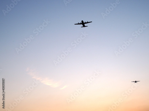 Aircraft in the sunset sky