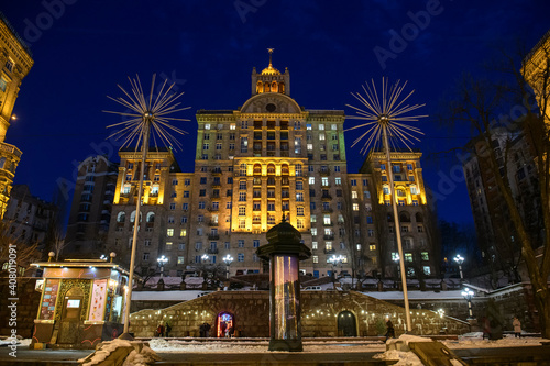 Evening view of illuminated Khreshchatyk, main street in Kyiv, Ukraine. Famous examples of Soviet architecture.