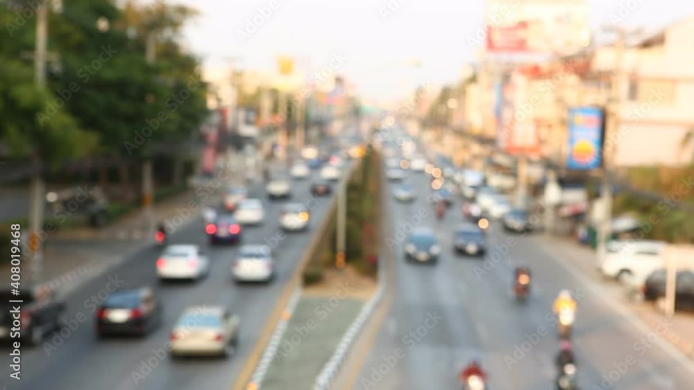 Blurred traffic at noon in downtown Chiangmai Thailand. Blurred traffic at noon in downtown Chiangmai Thailand.