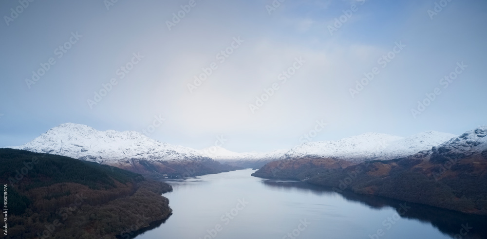 Mindfulness calm aerial view from above Loch Lomond at sunrise in Scotland