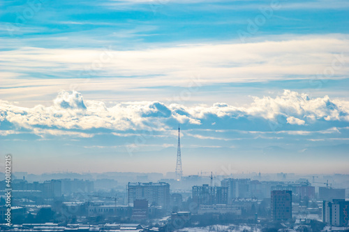 City from a height in smog on a winter day © onyx124
