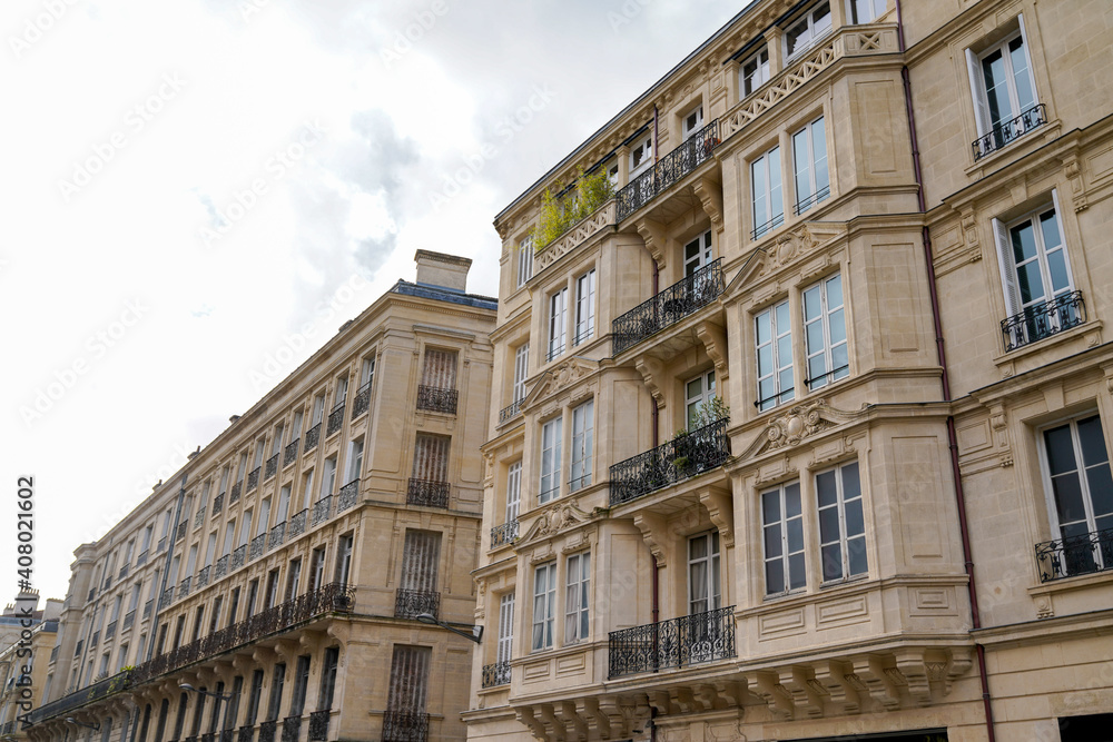 Typical design of Parisian architecture hausmann facade of french building in block of apartments in bordeaux France