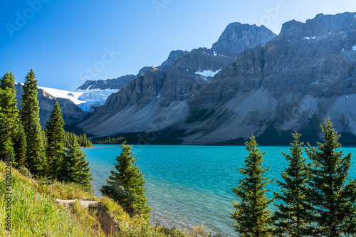 Bow Lake lakeshore in summer sunny day. Bow Glacier, Banff National Park, Canadian Rockies, Alberta, Canada.