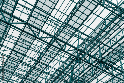 Abstract pattern geometry background from roof top greenhouse architecture. Metal streel building structure.