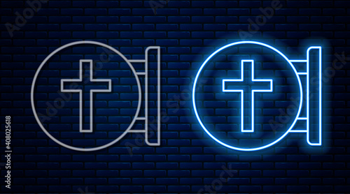 Glowing neon line Christian cross icon isolated on brick wall background. Church cross. Vector.