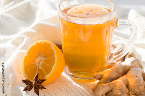 Autumn hot tea with lemon and spices