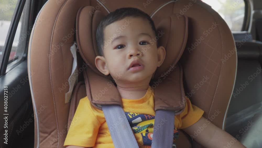 Little boy children on a car seat in the car. Little boy children on a car seat in the car.